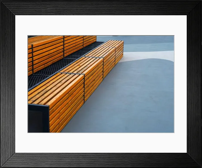 Framed Print : Modern wooden benches on the outdoor basketball court Framed Print : Modern wooden benches on the outdoor basketball court