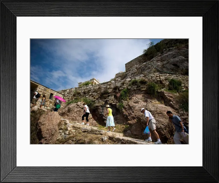 Framed Print : Tourists climb the path up to the Acropolis in Athens
