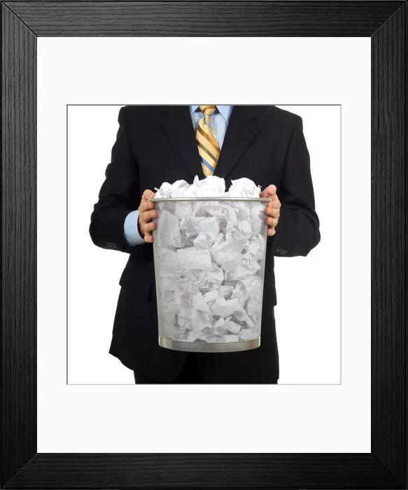 Framed Print : Business man in a business suit carrying out the trash