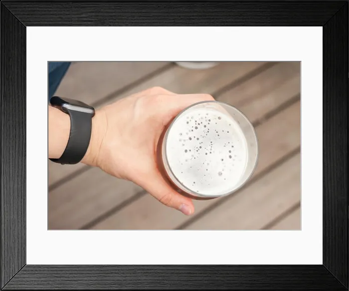 Framed Print : vacation concept hand with glass of beer Framed Print : vacation concept hand with glass of beer