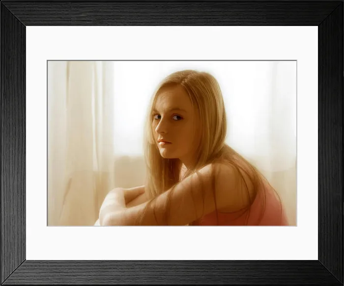 Framed Print : Teenage girl with blonde hair, sitting in front of net curtains in window Framed Print : Teenage girl with blonde hair, sitting in front of net curtains in window
