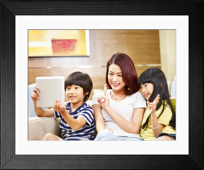 Framed Print : asian mother and two children son and daughter taking a selfie using digital tablet Framed Print : asian mother and two children son and daughter taking a selfie using digital tablet