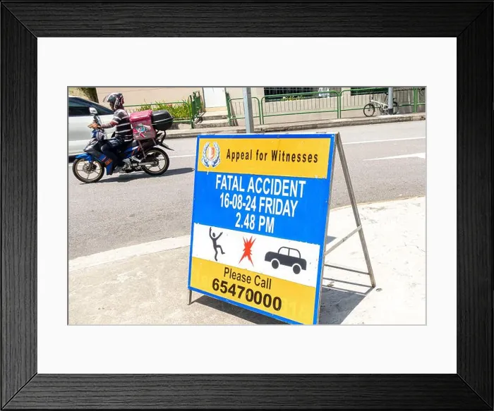 Framed Print : Roadside banner - 'Appeal for witnesses - fatal accident 16-08-24 Friday please call - Singapore