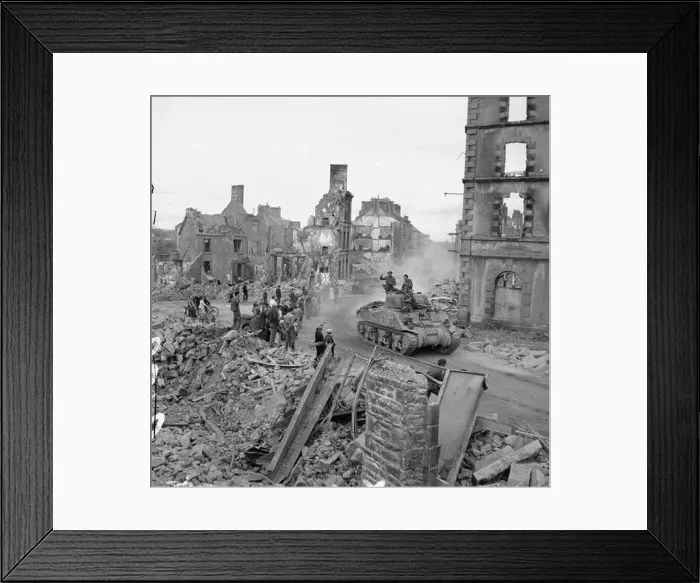 Framed Print : Sherman tank of the British Army driving through the ruins of Flers, Normandy, during operations on 17 August 1944 Framed Print : Sherman tank of the British Army driving through the ruins of Flers, Normandy, during operations on 17 August 1944
