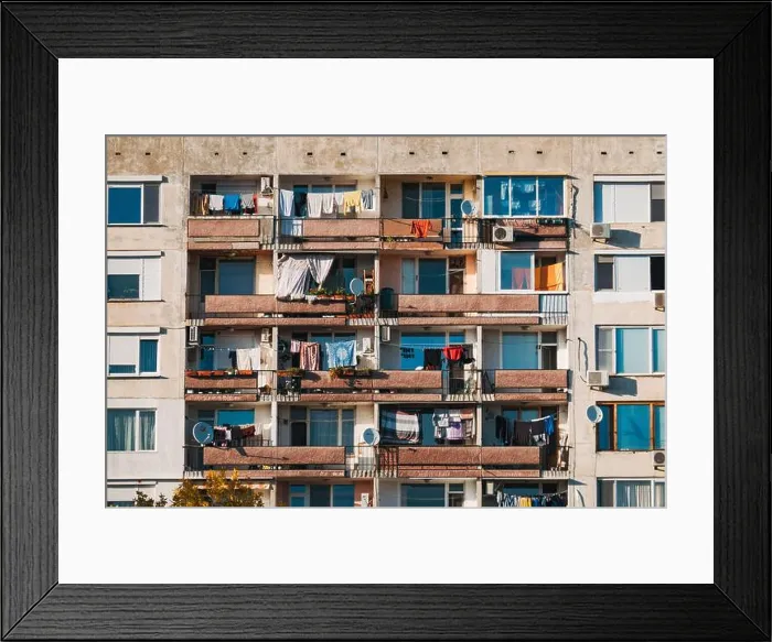 Framed Print : clothing hanging to dry on the balconies of Brutalist style apartments in outer Plovdiv, Bulgaria