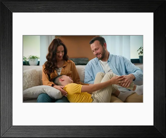 Framed Print : Happy caucasian family dad mom with cute kid son tickling having fun relax on sofa together carefree parents child boy Framed Print : Happy caucasian family dad mom with cute kid son tickling having fun relax on sofa together carefree parents child boy