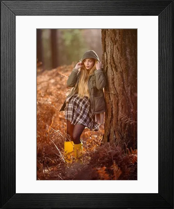 Framed Print : Young naturally beautiful women in a forest setting with orange autumnal winter hues wearing a green coat with the hood Framed Print : Young naturally beautiful women in a forest setting with orange autumnal winter hues wearing a green coat with the hood