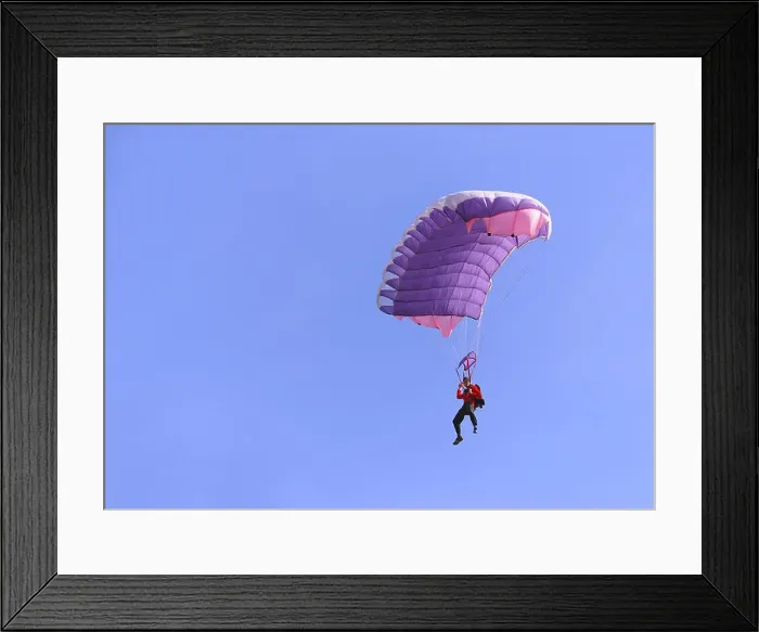 Framed Print : A purple parachute in a blue sky on a sunny day Framed Print : A purple parachute in a blue sky on a sunny day