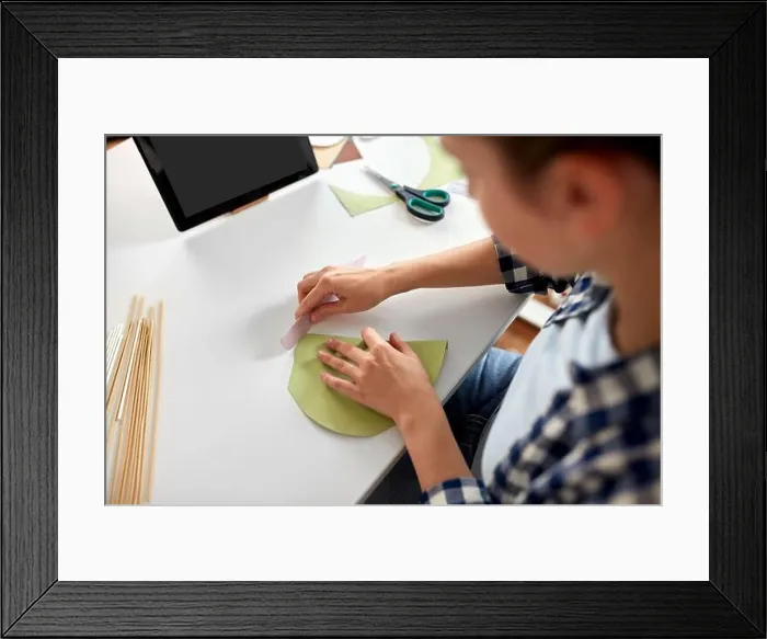 Framed Print : woman with tablet pc making paper craft at home Framed Print : woman with tablet pc making paper craft at home