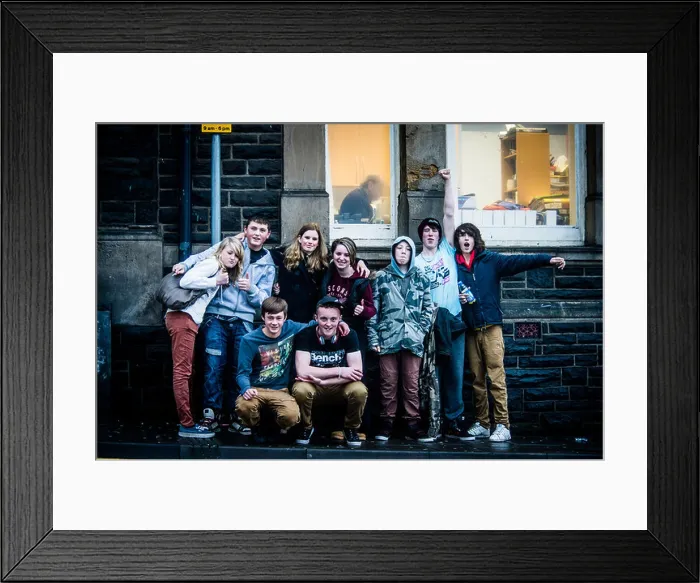 Framed Print : A mixed group of 9 happy smiling teenage boys and girls together, on a street, UK Framed Print : A mixed group of 9 happy smiling teenage boys and girls together, on a street, UK
