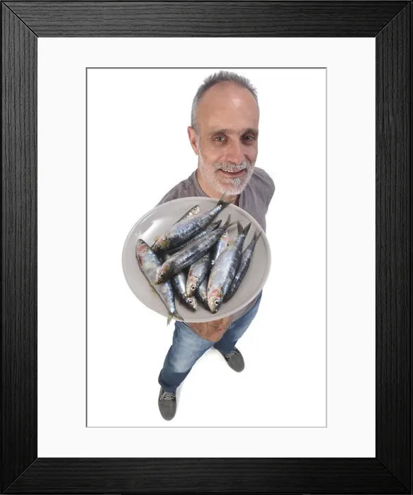 Framed Print : man with sardine on white background Framed Print : man with sardine on white background