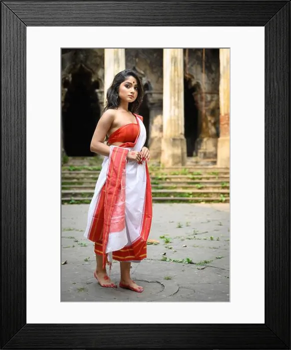 Framed Print : Portrait of beautiful Bengali woman in red and white traditional ethnic saree Framed Print : Portrait of beautiful Bengali woman in red and white traditional ethnic saree