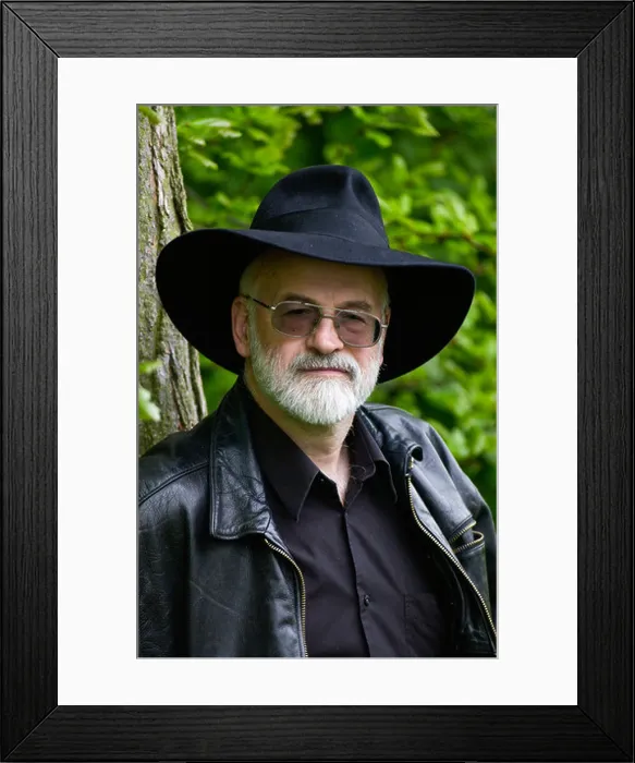 Framed Print : Terry Pratchett wearing his trademark black fedora hat pictured in countryside near Hay-on-Wye Powys Wales UK Framed Print : Terry Pratchett wearing his trademark black fedora hat pictured in countryside near Hay-on-Wye Powys Wales UK