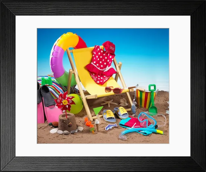 Framed Print : Child's bucket and spade, flippers, deckchair and various other seaside holiday items on beach Framed Print : Child's bucket and spade, flippers, deckchair and various other seaside holiday items on beach