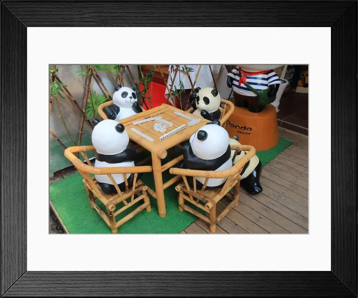 Framed Print : Pandas play mahjong display on West Street in Yangshou China Framed Print : Pandas play mahjong display on West Street in Yangshou China