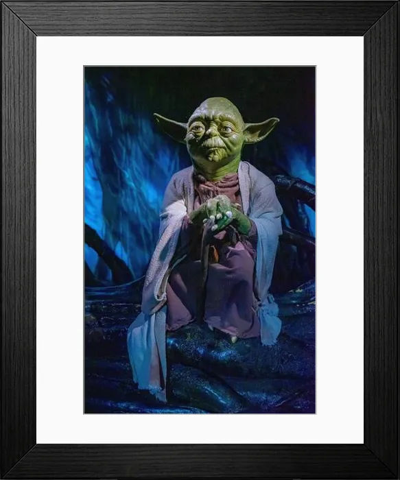 Framed Print : Yoda, represented in full-body wax in a frontal image.UK