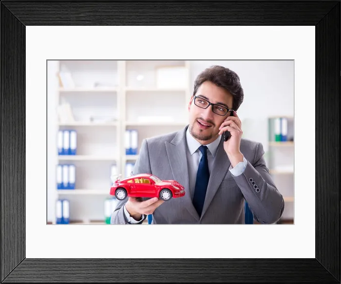 Framed Print : Agent offering car motor insurance Framed Print : Agent offering car motor insurance