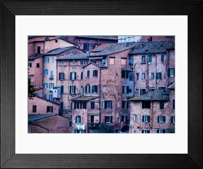 Framed Print : Aged red brick townhouses in medieval Siena, Italy Framed Print : Aged red brick townhouses in medieval Siena, Italy