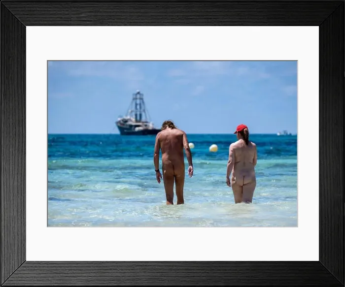 Framed Print : nudist couple bathing, Es Trenc beach, Campos municipality, Mallorca, Balearic Islands, Spain