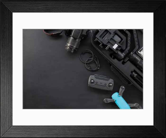 Framed Print : top view of work space photographer with digital camera and accessory on black background with copy space. flat lay Framed Print : top view of work space photographer with digital camera and accessory on black background with copy space. flat lay