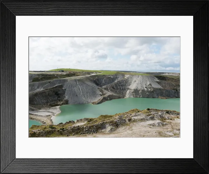 Framed Print : Spoil heaps alongside water filled china-clay pit on edge of Dartmoor Framed Print : Spoil heaps alongside water filled china-clay pit on edge of Dartmoor