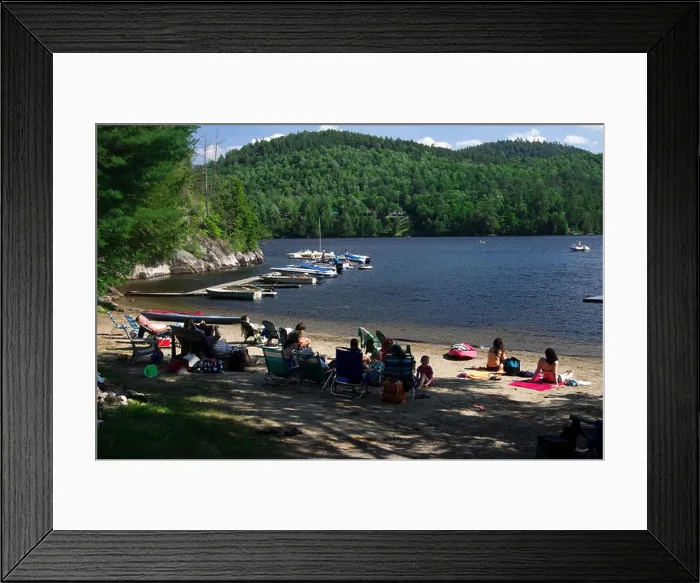 Framed Print : Paradox Lake, residents sit in beach chairs in the shade at water's edge, boats at the dock Framed Print : Paradox Lake, residents sit in beach chairs in the shade at water's edge, boats at the dock