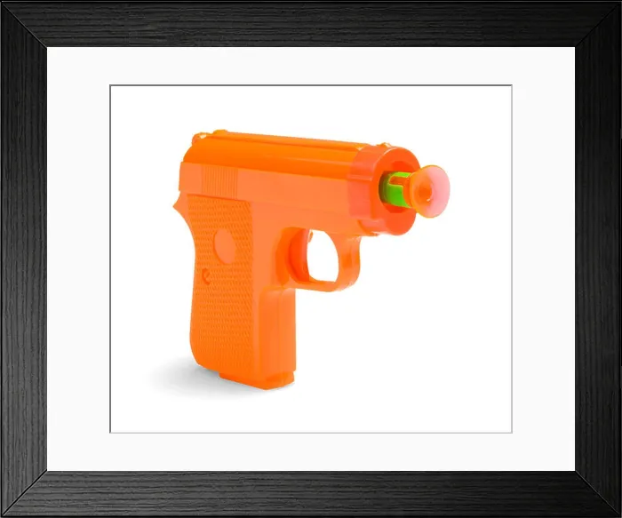 Framed Print : Orange Plastic Toy Dart Gun Isolated on White Background