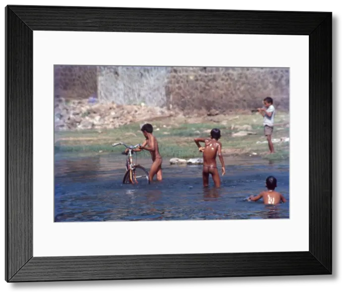 Framed Print : Village Boys Bathing in Lake Near Pune, Maharashtra, India Framed Print : Village Boys Bathing in Lake Near Pune, Maharashtra, India