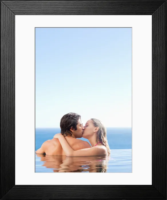 Framed Print : Back view of couple kissing in the swimming pool Framed Print : Back view of couple kissing in the swimming pool