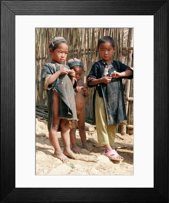 Framed Print : Ethnic Akha children wearing traditional clothes in tribal village near Phongsali, Laos Framed Print : Ethnic Akha children wearing traditional clothes in tribal village near Phongsali, Laos
