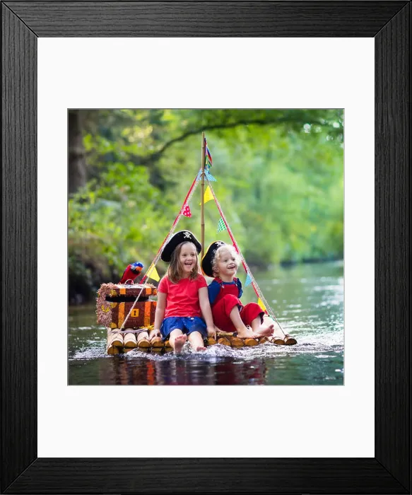 Framed Print : Kids dressed in pirate costumes and hats with treasure chest Framed Print : Kids dressed in pirate costumes and hats with treasure chest