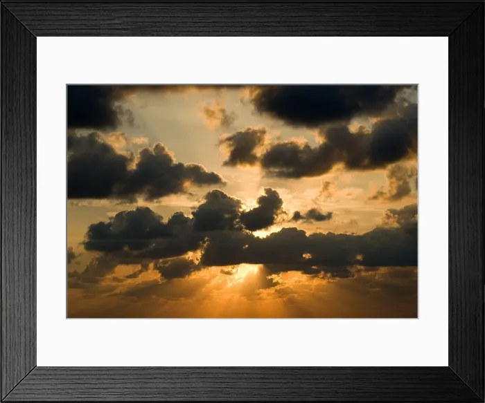 Framed Print : Early morning sun bursting through clouds Framed Print : Early morning sun bursting through clouds