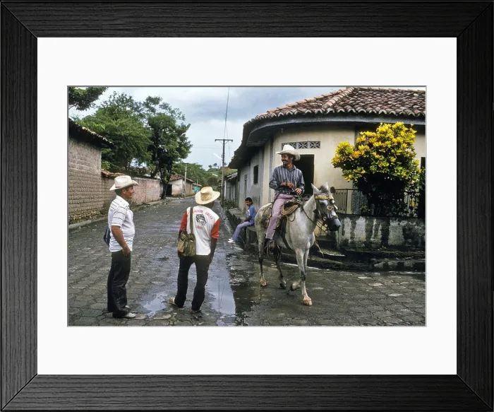 Framed Print : Cattle farmers passing through the village of Anamoros, El Salvador Framed Print : Cattle farmers passing through the village of Anamoros, El Salvador