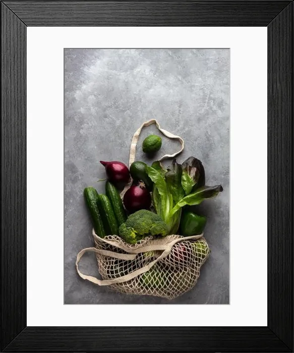 Framed Print : Fresh vegetables and fruits in a string bag on a concrete background Framed Print : Fresh vegetables and fruits in a string bag on a concrete background