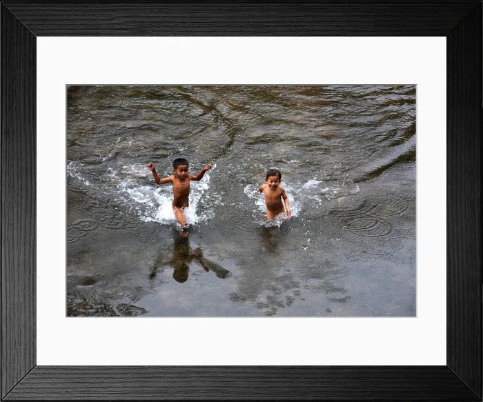 Framed Print : Children on River at the village of Ban Kong Lo on Laos Framed Print : Children on River at the village of Ban Kong Lo on Laos