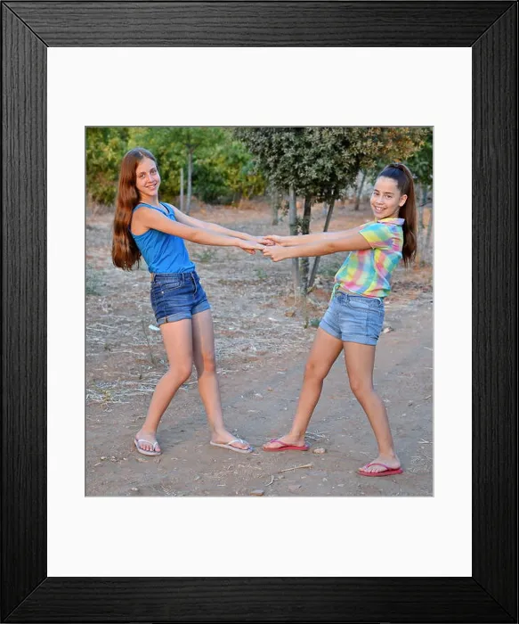 Framed Print : Best Friends Forever - two 12 year old teenage girls holding hands Framed Print : Best Friends Forever - two 12 year old teenage girls holding hands