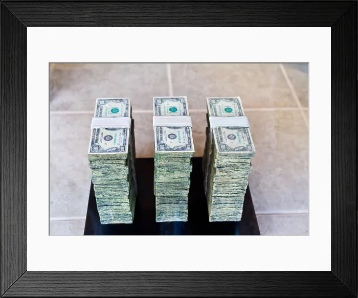 Framed Print : One Million dollars in stacked $100 bills Framed Print : One Million dollars in stacked $100 bills