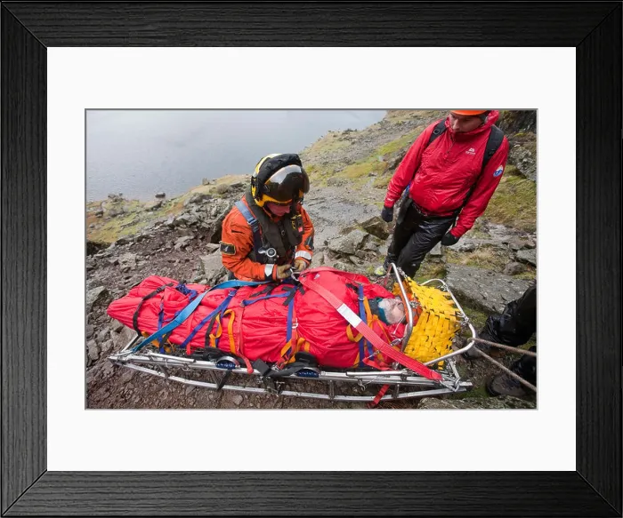 Framed Print : A walker with a compound leg fracture is treated by Langdale Ambleside Mountain Rescue Team in Easy Gully on Pavey Ark