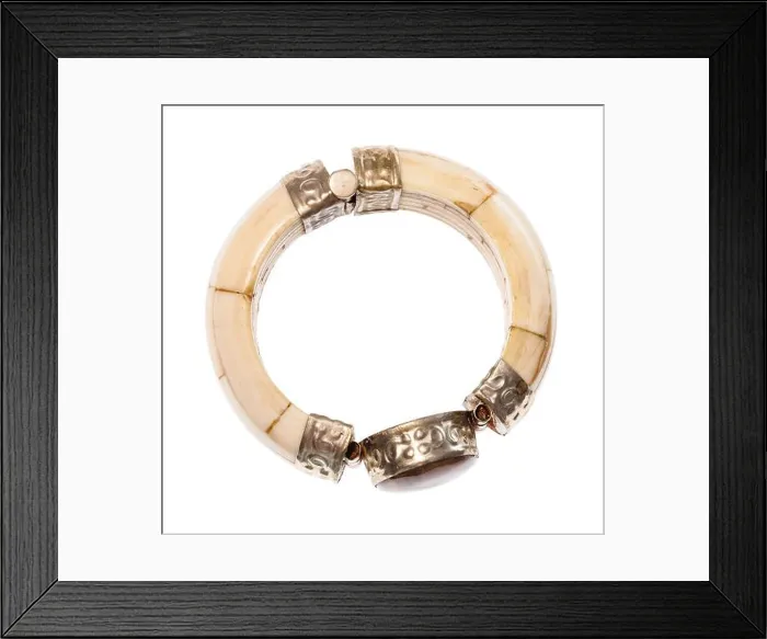Framed Print : top view of antique arabic camel bone bracelet with natural stone insert isolated on white background Framed Print : top view of antique arabic camel bone bracelet with natural stone insert isolated on white background