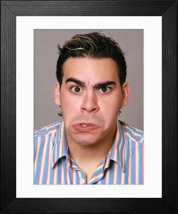 Framed Print : young man with a funny face