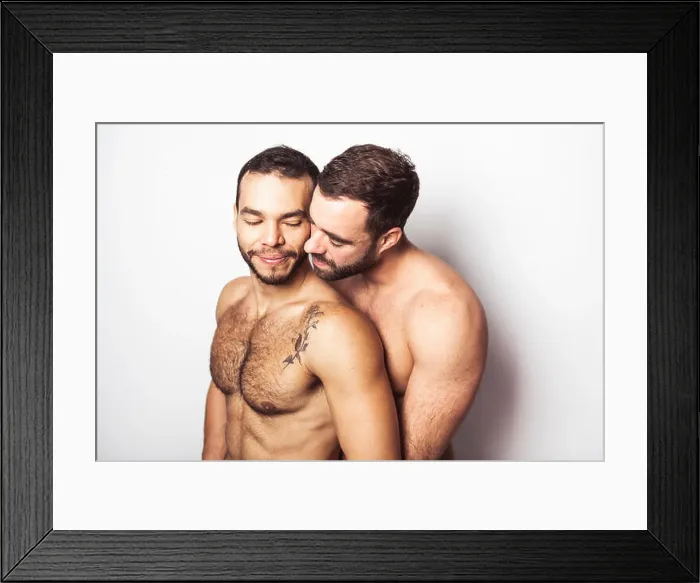 Framed Print : Young homosexuals gay couple love each other on a white background Framed Print : Young homosexuals gay couple love each other on a white background