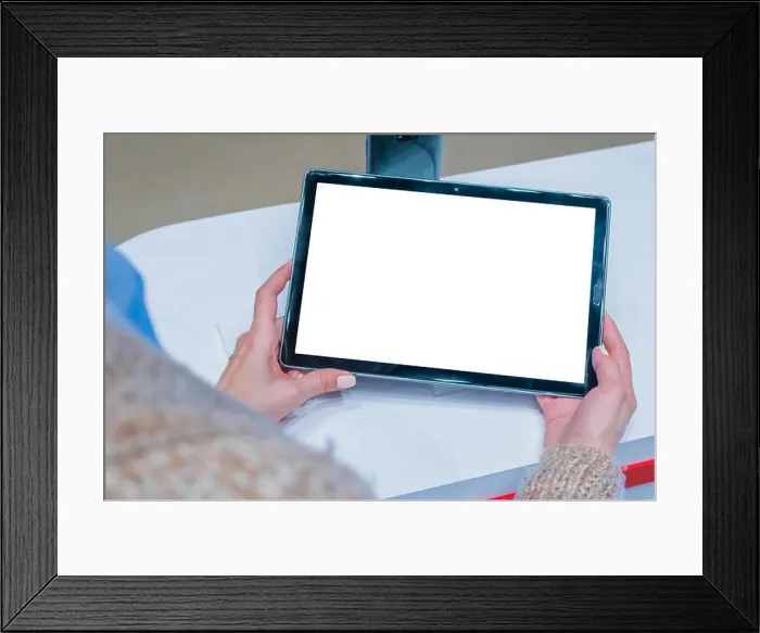 Framed Print : Mock up: woman looking at smartphone with blank white screen at store, shop Framed Print : Mock up: woman looking at smartphone with blank white screen at store, shop