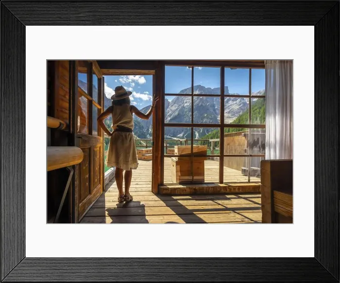 Framed Print : Woman enjoying breathtaking views of lake braies Framed Print : Woman enjoying breathtaking views of lake braies
