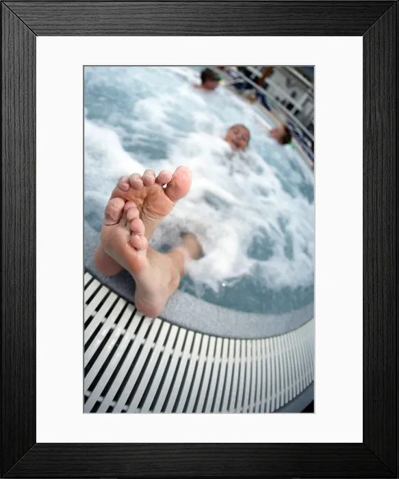 Framed Print : Boy's Wrinkled Feet Sticking out Hot Tub Framed Print : Boy's Wrinkled Feet Sticking out Hot Tub