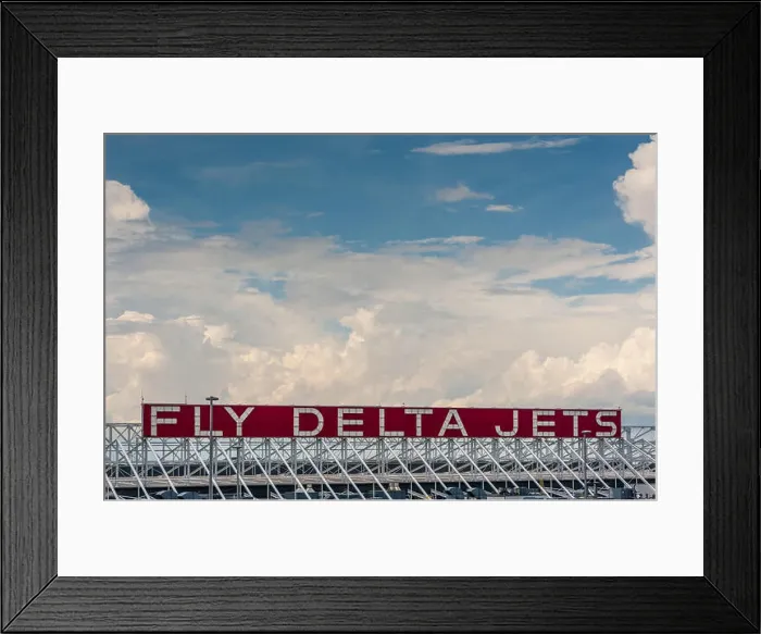 Framed Print : The 'Fly Delta Jets' sign at the Delta facility as seen from the International Terminal at Atlanta International Framed Print : The 'Fly Delta Jets' sign at the Delta facility as seen from the International Terminal at Atlanta International