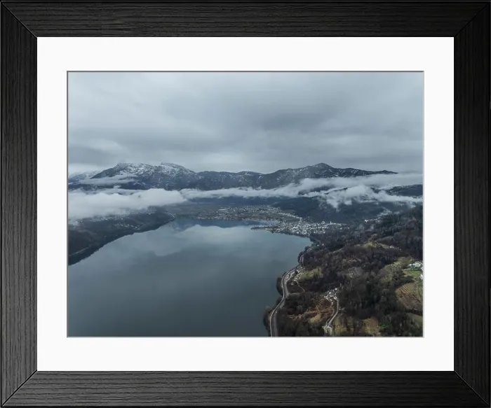 Framed Print : Aerial view of Caldonazzo Lake with snowy mountain peaks and misty valleys, Pergine Valsugana, Trentino, Italy Framed Print : Aerial view of Caldonazzo Lake with snowy mountain peaks and misty valleys, Pergine Valsugana, Trentino, Italy