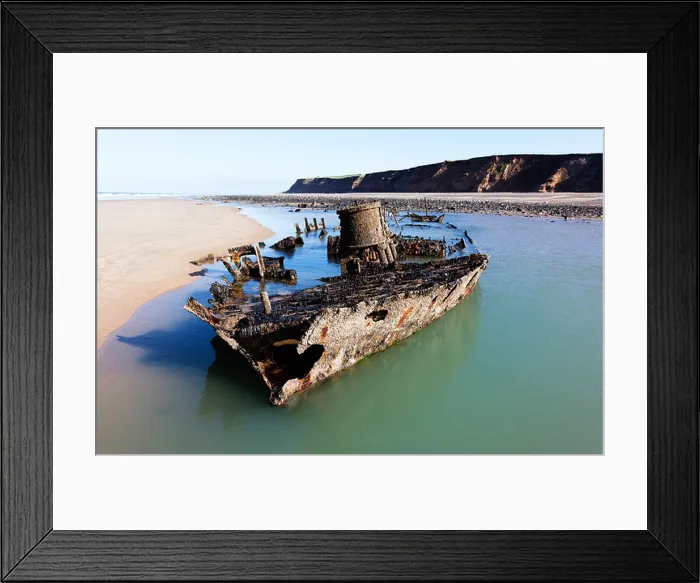 Framed Print : Shipwreck near Jurby on beach Isle of Man Framed Print : Shipwreck near Jurby on beach Isle of Man