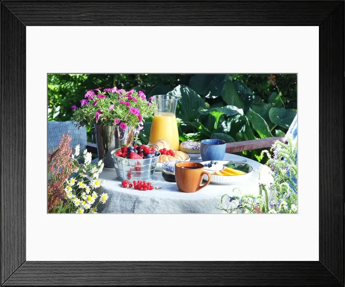 Framed Print : Continental breakfast on the garden table. Country lifestyle or weekend morning concept. Peaceful rural scenery Framed Print : Continental breakfast on the garden table. Country lifestyle or weekend morning concept. Peaceful rural scenery