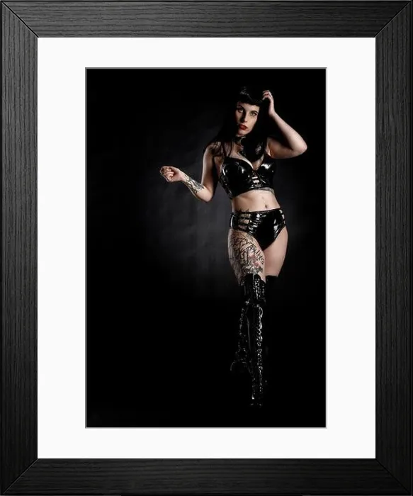 Framed Print : Woman with black hair and tattos in vinyl and latex outfit, BDSM Framed Print : Woman with black hair and tattos in vinyl and latex outfit, BDSM
