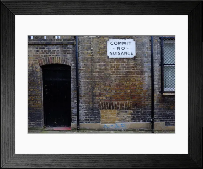 Framed Print : An old Dickensian Commit No Nuisance sign in Southwark, London Framed Print : An old Dickensian Commit No Nuisance sign in Southwark, London
